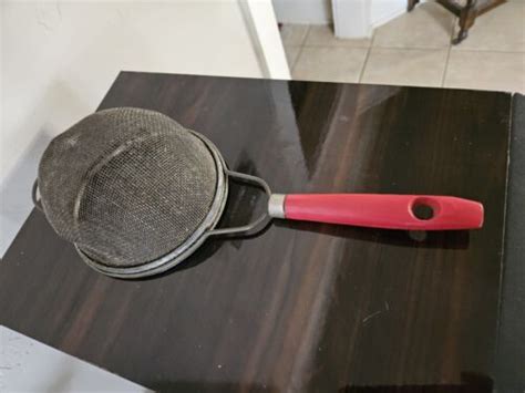 vintage mesh fabric strainer with metal rings on ends|Vintage Large Metal Mesh Kitchen Strainer Red Wood Handle .